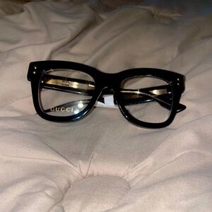 Gucci, black frame glasses
